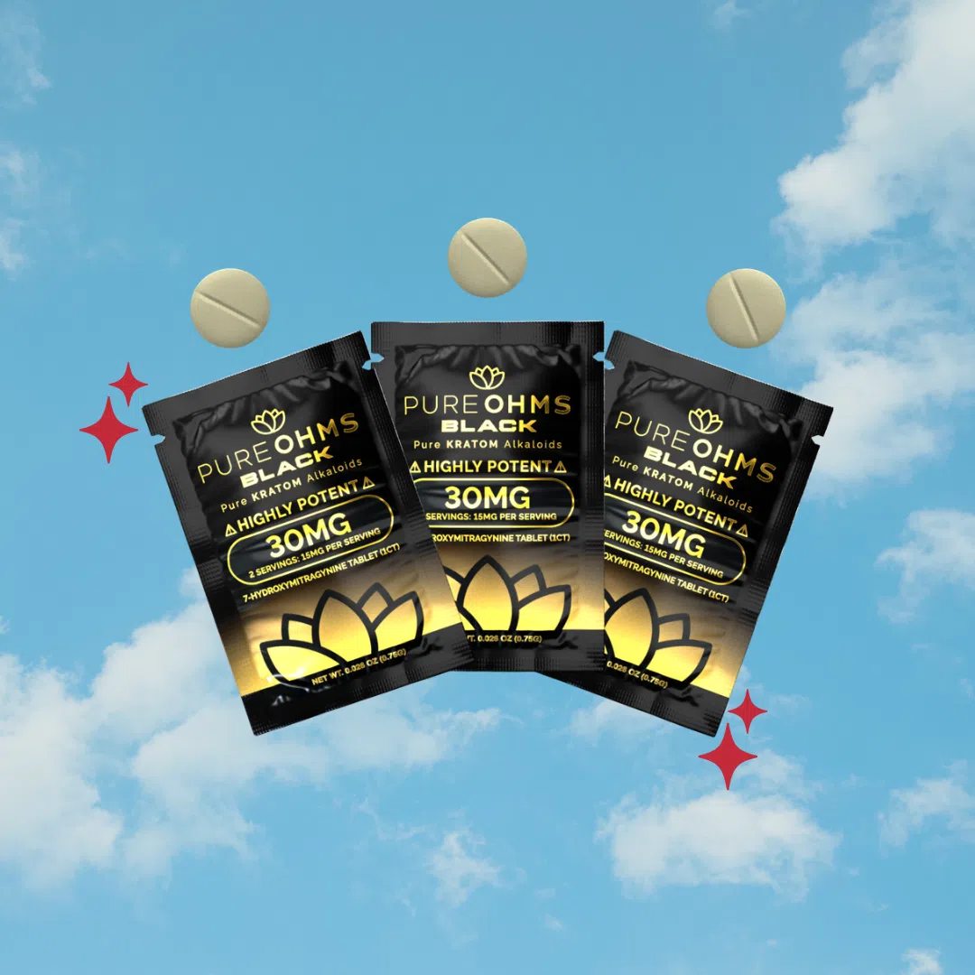three bags and tablets of Pure Ohms Black 7-OH Tablet 30mg - 6 Count over blue sky background